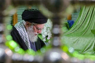 In this photo released by an official website of the office of the Iranian supreme leader, Supreme Leader Ayatollah Ali Khamenei prays at the grave of the late revolutionary founder Ayatollah Khomeini, commemorating the 47th anniversary of his return from exile during the 1979 Islamic Revolution, just outside Tehran, Iran, Saturday, 31 January 2026